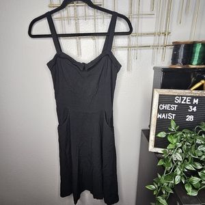 Switchblade stiletto black dress